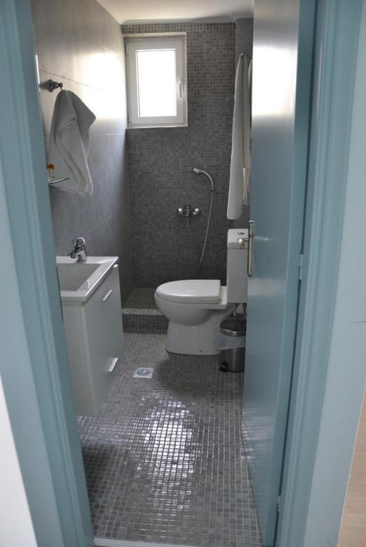 Valente Perlia Rooms Poros Town ภายนอก รูปภาพ